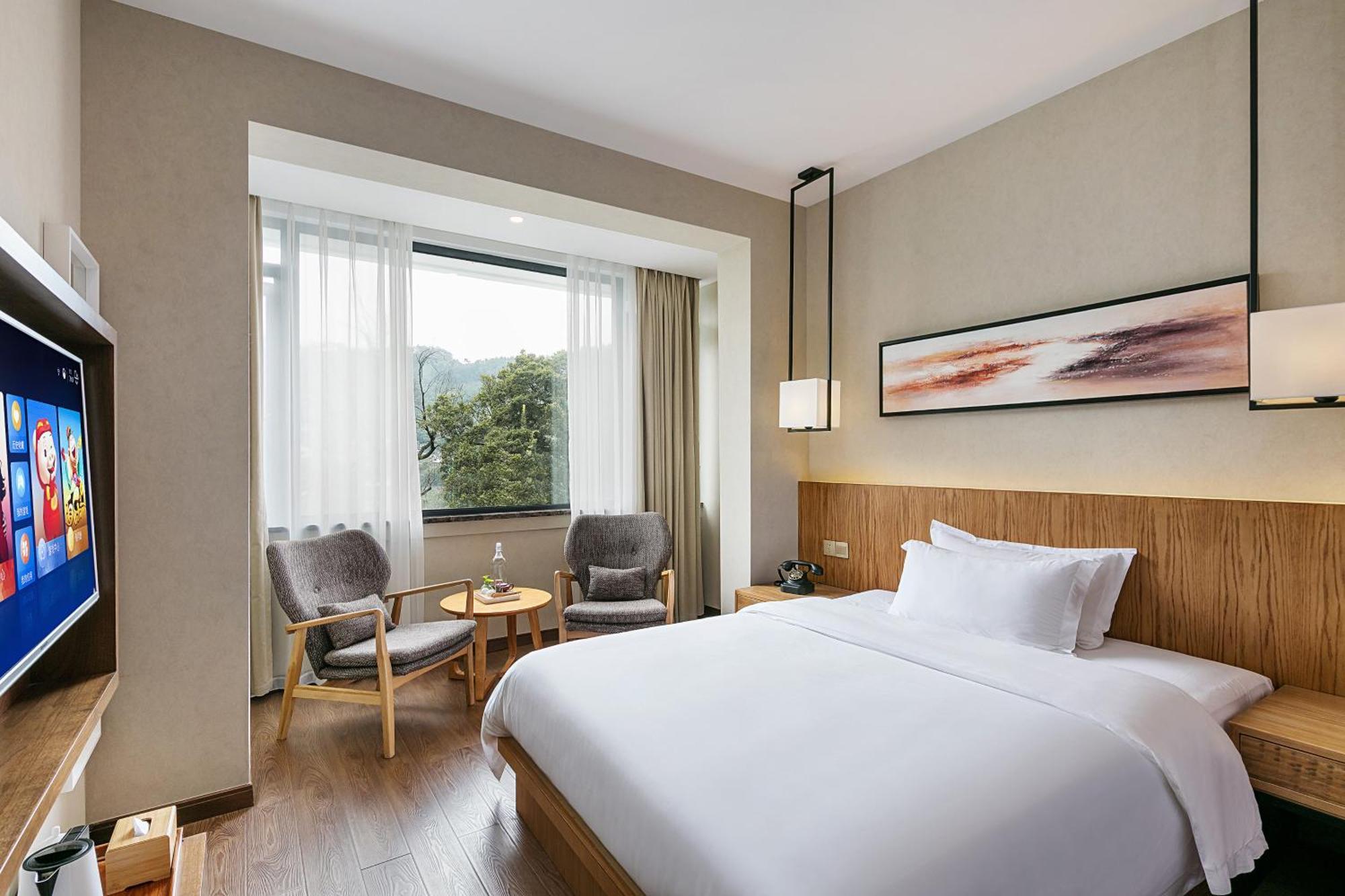 Hangzhou Puyu Travelling With Hotel Exterior photo